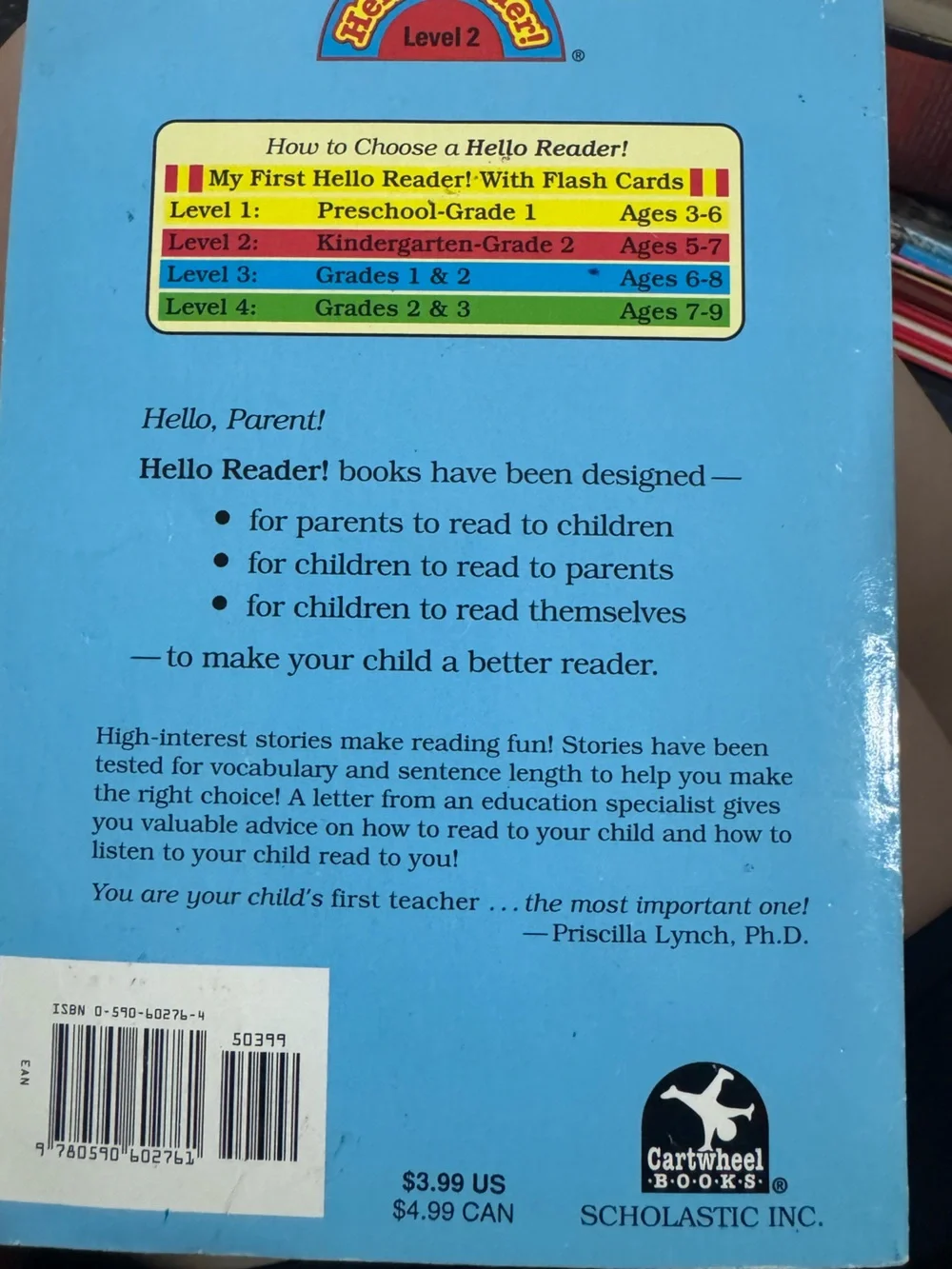 BUNDLE of 2- Scholastic Yellow Hat & Polka-Dot Dress Puppy Picture Book